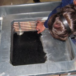 Image of Technician performing air quality testing