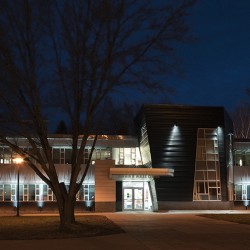 Exterior image of Darwin R. Wales Administration Building at night.