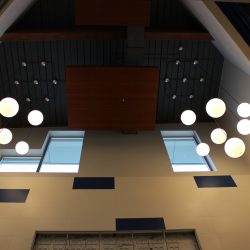Contemporary ceiling design with suspended light fixtures inside Chenango Forks Central School District