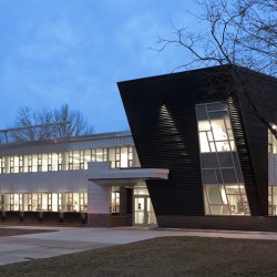 Exterior image of Darwin R. Wales Administration Building at dusk.