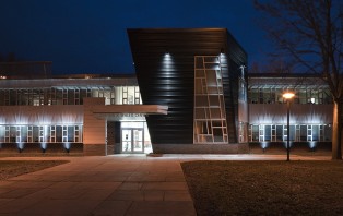Exterior image of Darwin R. Wales Administration Building at night.
