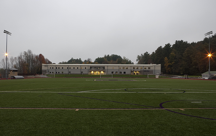 Exterior image of Kerr-Pegula Athletic Field House at night.