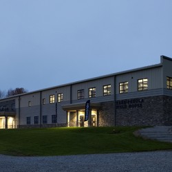 Exterior image of Kerr-Pegula Athletic Field House at night.