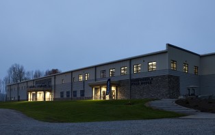 Exterior image of Kerr-Pegula Athletic Field House at night.