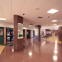 Interior image of school hallway.