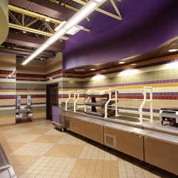 Interior view of Worcester Central School District student servery featuring stainless steel counters.