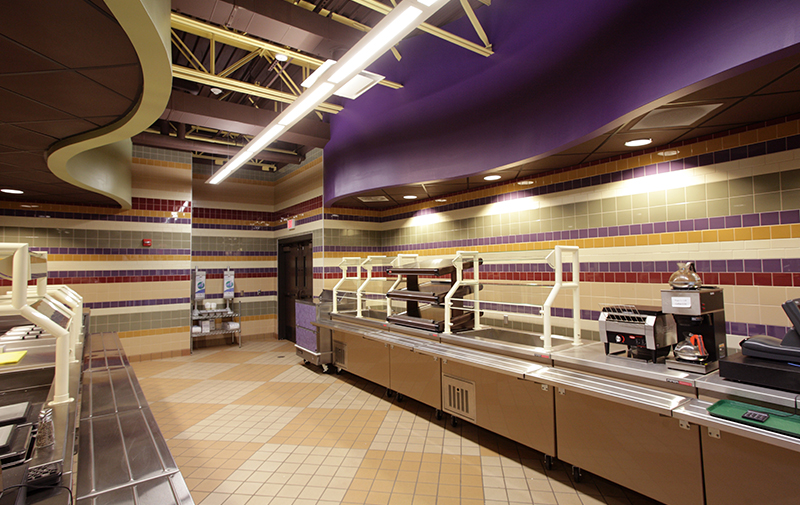 Interior view of Worcester Central School District student servery featuring stainless steel counters.