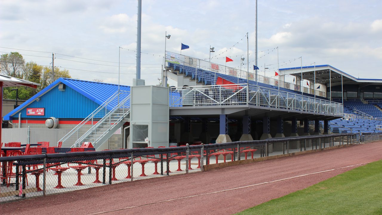 Upward view of the party deck at Mirabito Stadium, formerly NYSEG Stadium, showcasing elevated group seating.