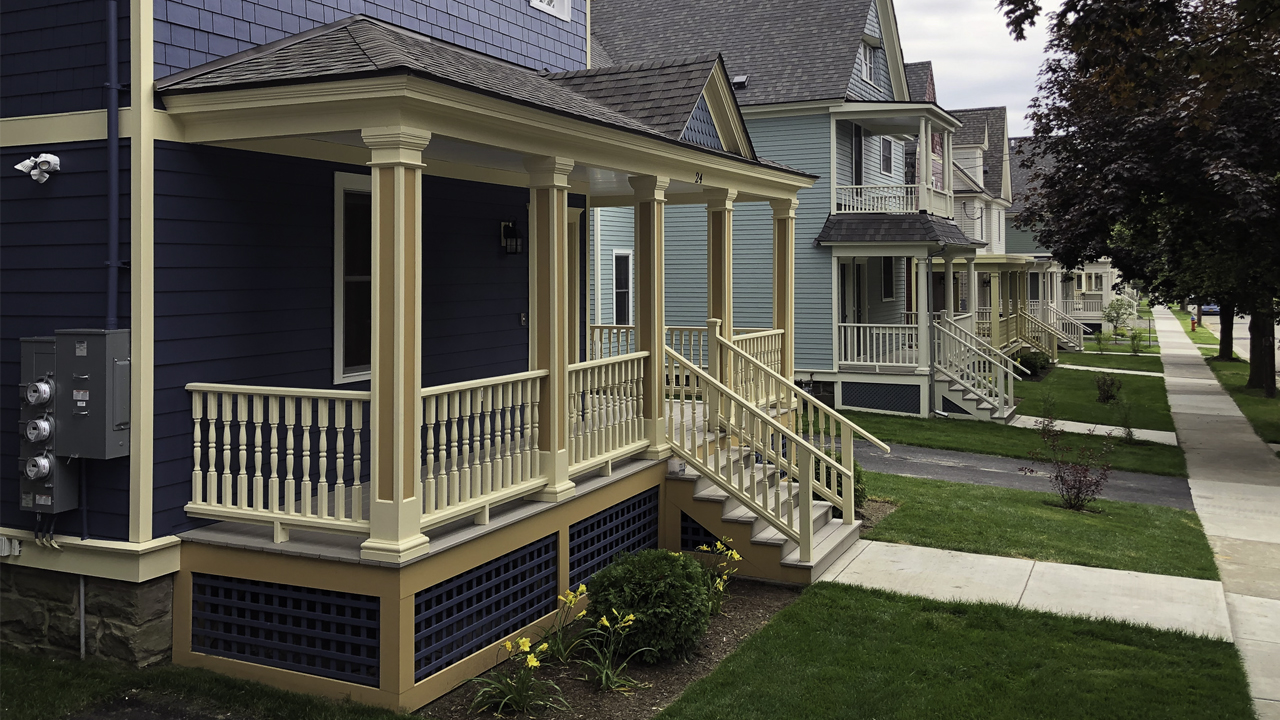 Street view showcasing the revitalized affordable housing buildings from Keystone’s rehabilitation project.
