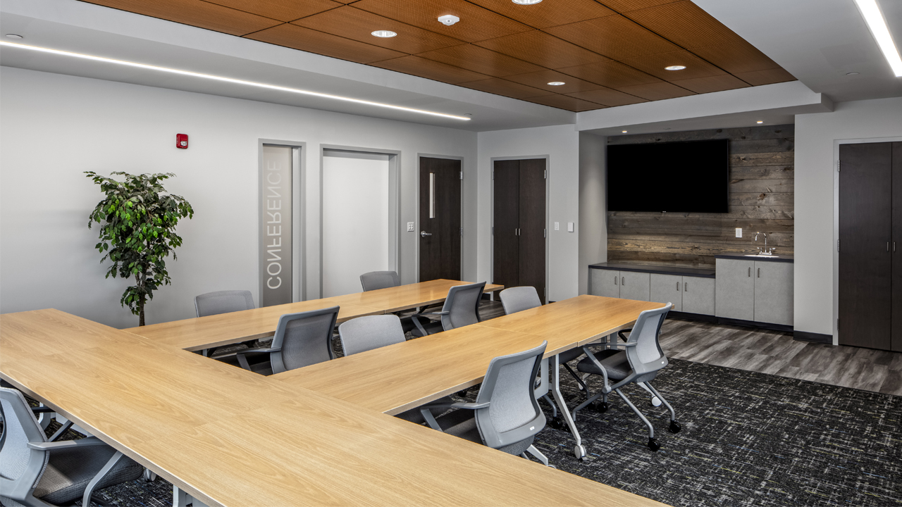 Interior view of the conference room at Catskill Watershed Corporation, featuring a professional meeting space with seating and presentation equipment.