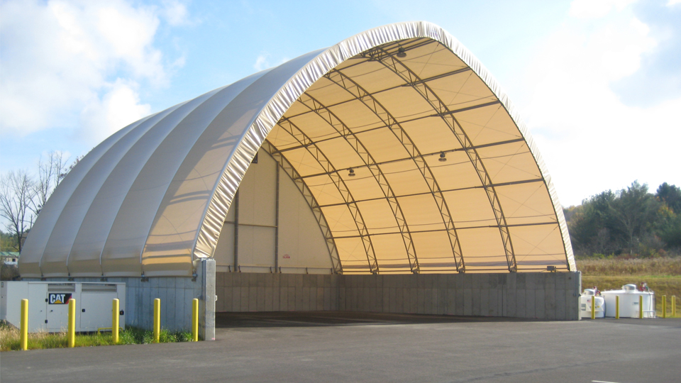 Exterior view of the Town of Nichols salt storage facility, featuring a durable fabric-covered structure for road maintenance materials.
