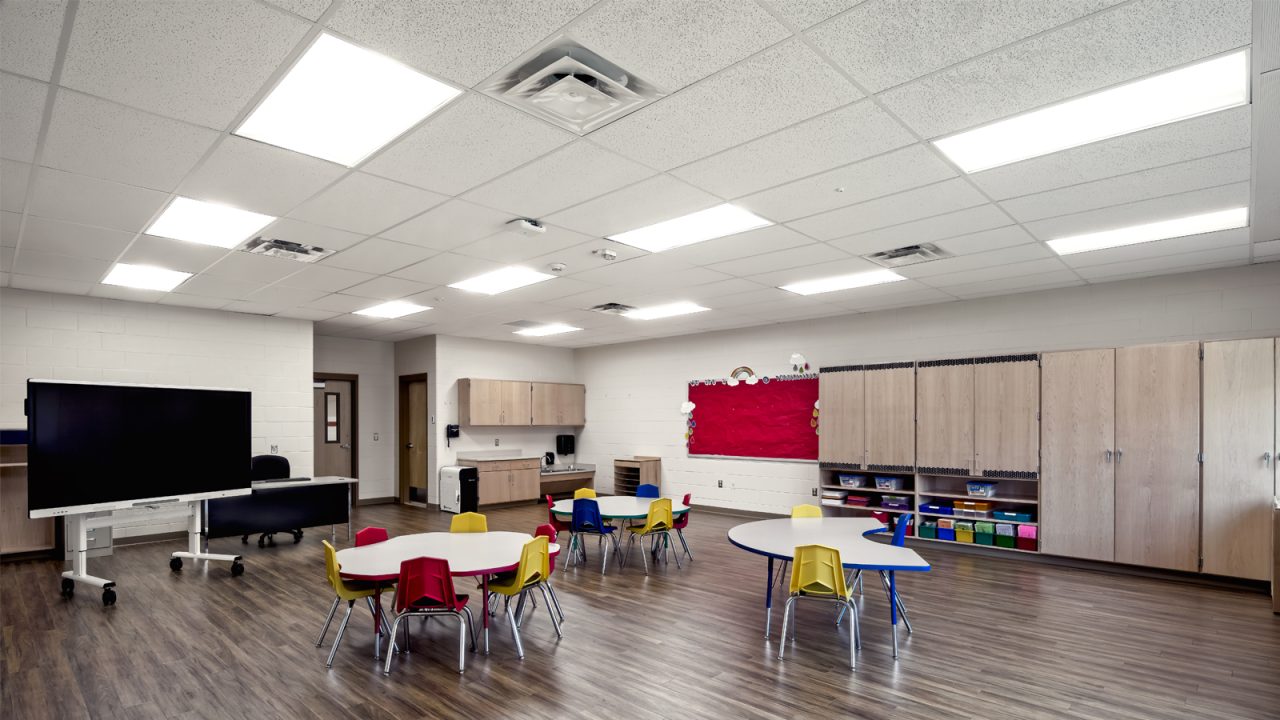 Interior view of a classroom at Round Hill Elementary School, featuring student desks, learning materials, and a welcoming educational environment.