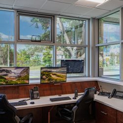 Interior view of the City of Binghamton Fire Station watch room, featuring workstations and communication equipment used for emergency monitoring and response coordination.