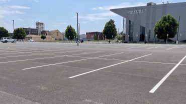 View of the parking lot at the Nexus Center in Utica, NY, supporting the tournament-based recreation facility.