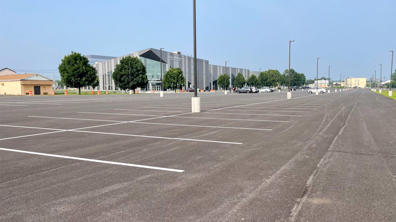 View of the parking lot at the Nexus Center in Utica, NY, supporting the tournament-based recreation facility.